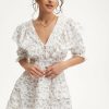 Wholesale * Solado Puff Sleeve Layered Ruffle Trim Floral Print Mini Dress White