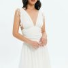 Wholesale * Solado Plunge Neck Backless Asymmetrical Hem Mini Dress White